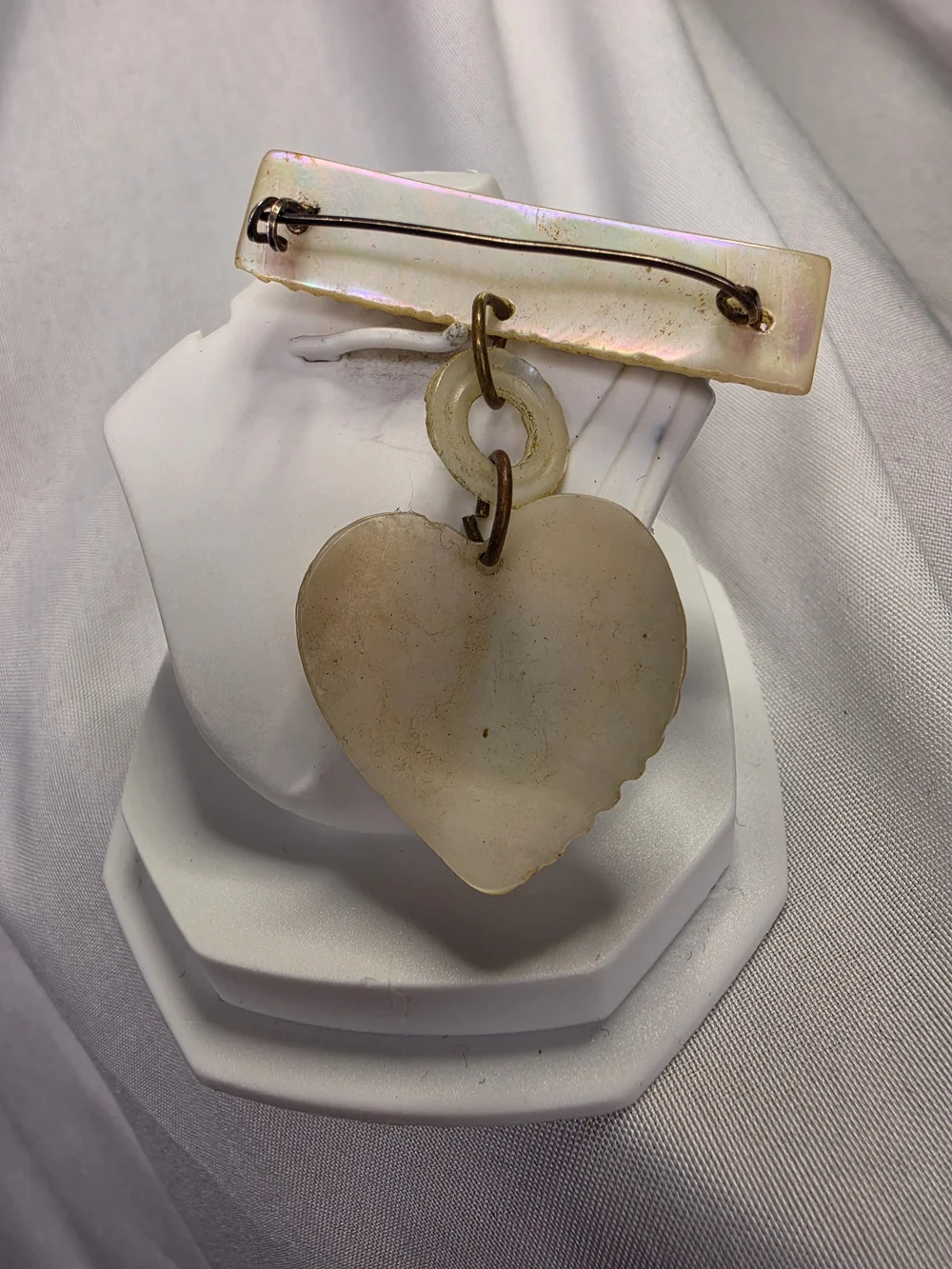 Vintage World War II-era U.S. Navy sweetheart brooch, made from carved MOP